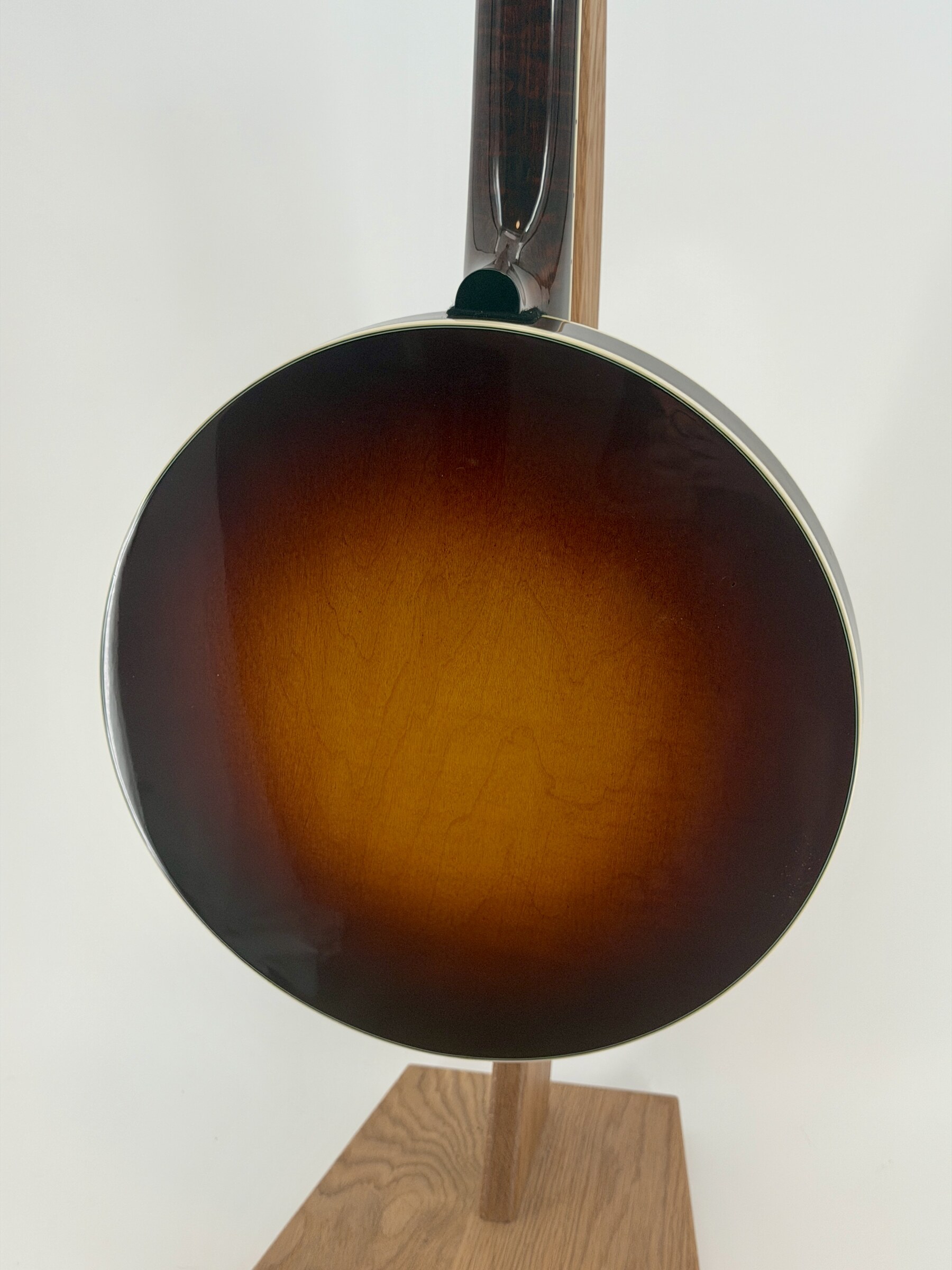 Flamed maple resonator back in a sunburst finish