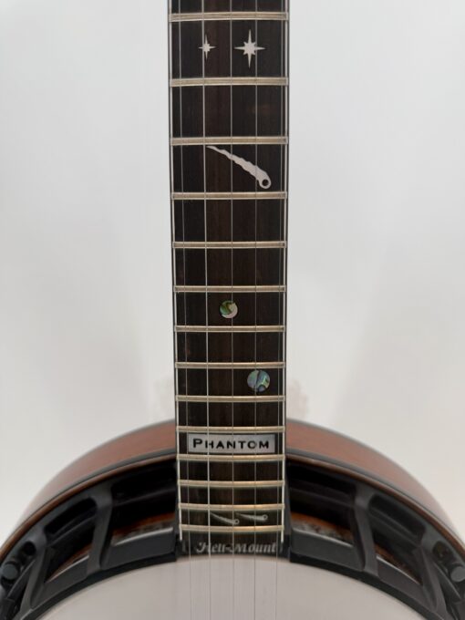 2008 Nechville Custom banjo with the Phantom fretboard plate and space-theme inlay, at Banjo Warehouse in Yellow Springs, Ohio.