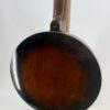 2008 Nechville Custom banjo with a mahogany resonator, angled back view, at Banjo Warehouse in Yellow Springs, Ohio.