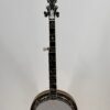 1989 Stelling Master's Cross 5-string banjo with a full front view of the peghead cross and plain nickel hardware, at Banjo Warehouse in Yellow Springs, Ohio.